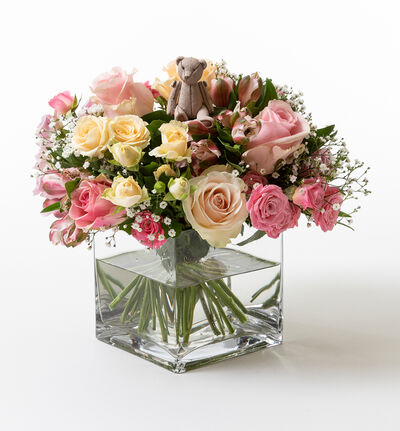 Bamsebukett i rosatoner med vase